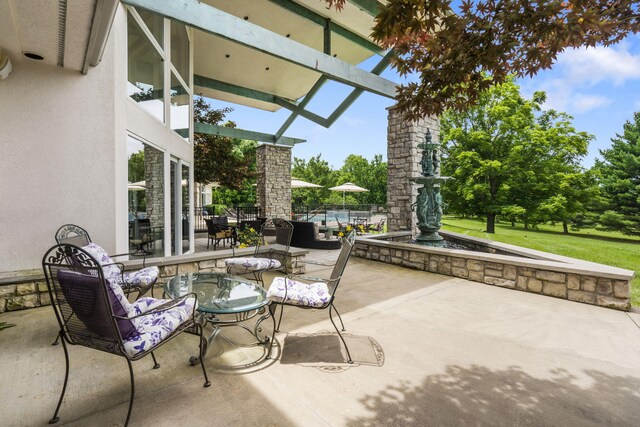 318 S Farm Rd Unit 193, Springfield, MO 65809 - view of patio / terrace featuring a pergola