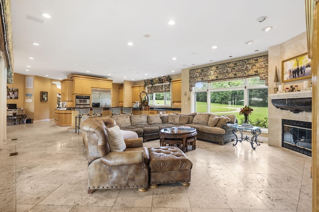 318 S Farm Rd Unit 193, Springfield, MO 65809 - living room with recessed lighting and a fireplace