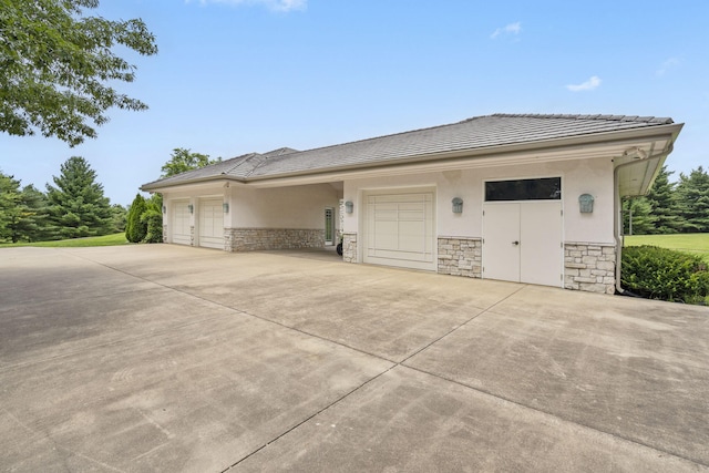 318 S Farm Rd Unit 193, Springfield, MO 65809 - garage with concrete driveway
