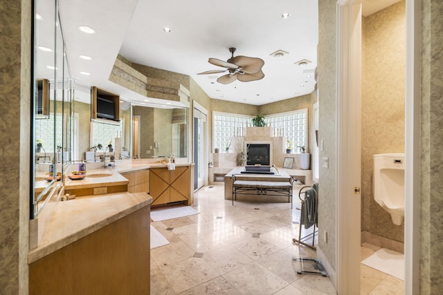318 S Farm Rd Unit 193, Springfield, MO 65809 - bathroom with ceiling fan, vanity, recessed lighting, and tile patterned floors