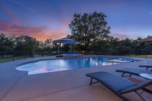318 S Farm Rd Unit 193, Springfield, MO 65809 - pool at dusk with a patio area and a pool with connected hot tub