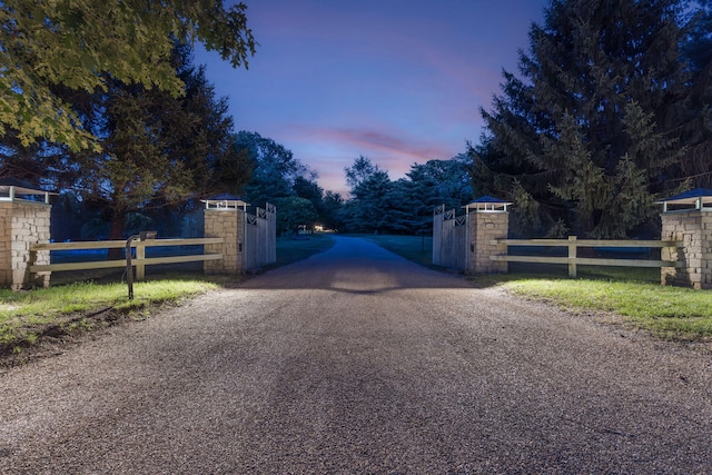 318 S Farm Rd Unit 193, Springfield, MO 65809 - view of road featuring a gated entry and a gate