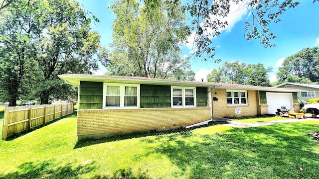 1214 7th St, Monett, MO 65708 - view of front facade featuring brick siding and an attached garage