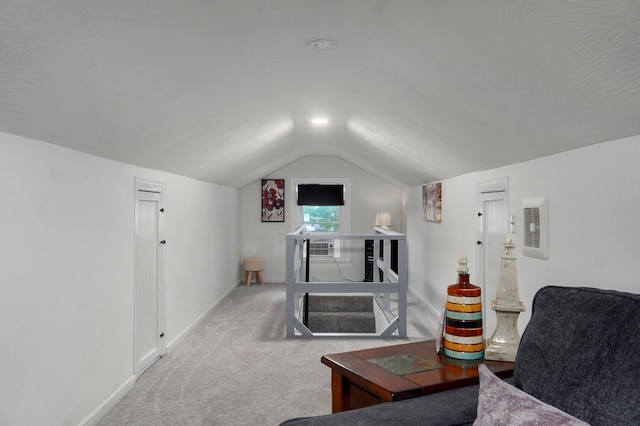 1841 E Dale St, Springfield, MO 65803 - carpeted living area featuring vaulted ceiling and baseboards