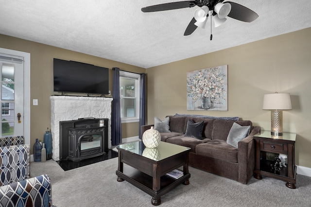 1841 E Dale St, Springfield, MO 65803 - carpeted living area featuring a textured ceiling and a ceiling fan