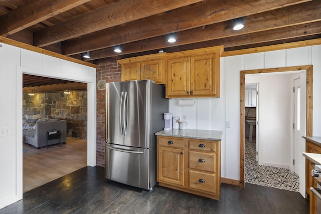 196 Lakeside Way, Forsyth, MO 65653 - kitchen with freestanding refrigerator, dark wood-type flooring, light stone counters, and a wooden ceiling with exposed beams