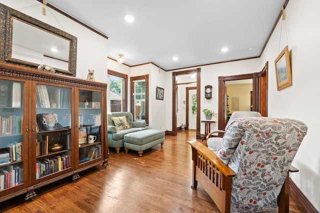 933 W Pershing St, Springfield, MO 65806 - sitting room featuring ornamental molding, wood finished floors, and recessed lighting