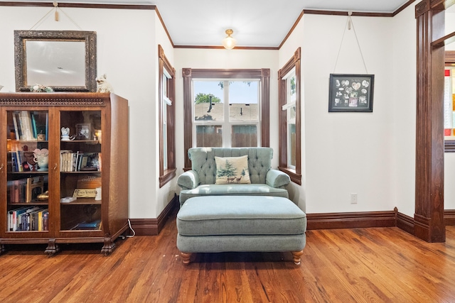933 W Pershing St, Springfield, MO 65806 - sitting room with wood finished floors and crown molding