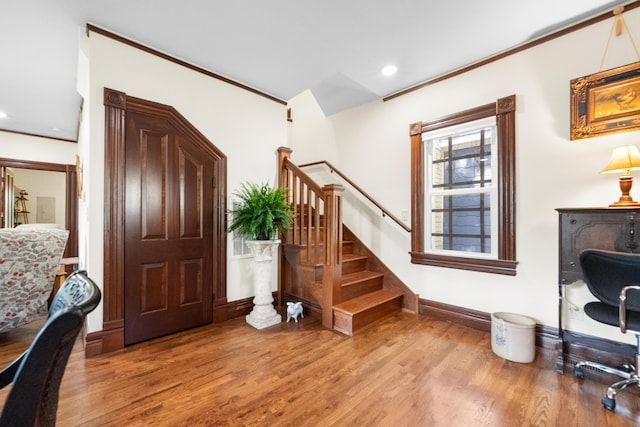 933 W Pershing St, Springfield, MO 65806 - entrance foyer with wood finished floors, recessed lighting, stairway, and crown molding