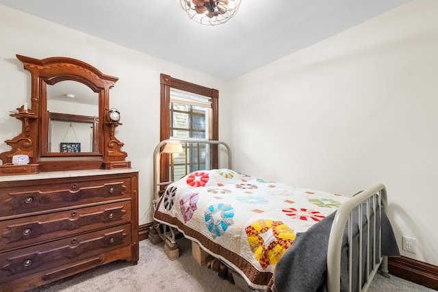 933 W Pershing St, Springfield, MO 65806 - bedroom featuring light colored carpet