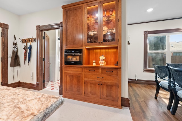 933 W Pershing St, Springfield, MO 65806 - bar featuring black oven and wood finished floors