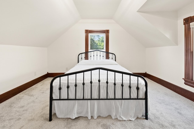 933 W Pershing St, Springfield, MO 65806 - unfurnished bedroom with carpet flooring and lofted ceiling