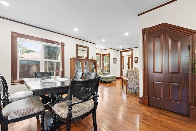 933 W Pershing St, Springfield, MO 65806 - dining area with ornamental molding, light wood finished floors, and recessed lighting