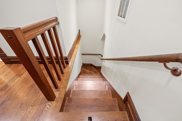 933 W Pershing St, Springfield, MO 65806 - staircase with wood finished floors