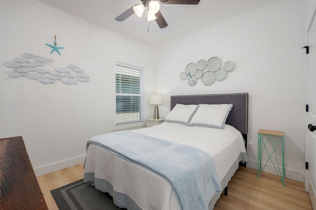 653 W Arbor Glenn Dr, Nixa, MO 65714 - bedroom with light wood-style floors and ceiling fan