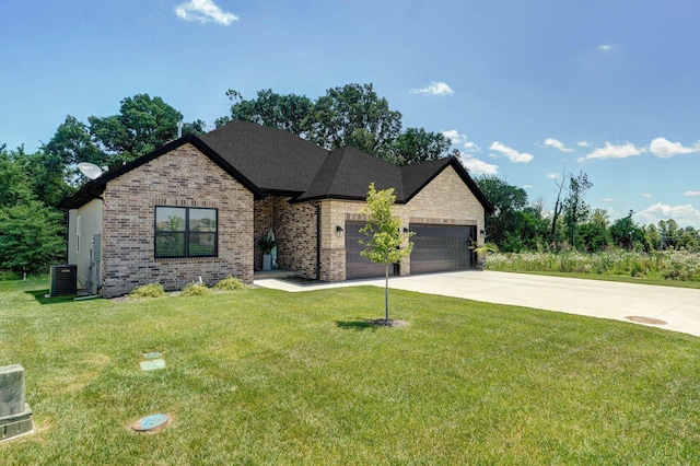 653 W Arbor Glenn Dr, Nixa, MO 65714 - french country style house with a garage, concrete driveway, a front yard, and brick siding