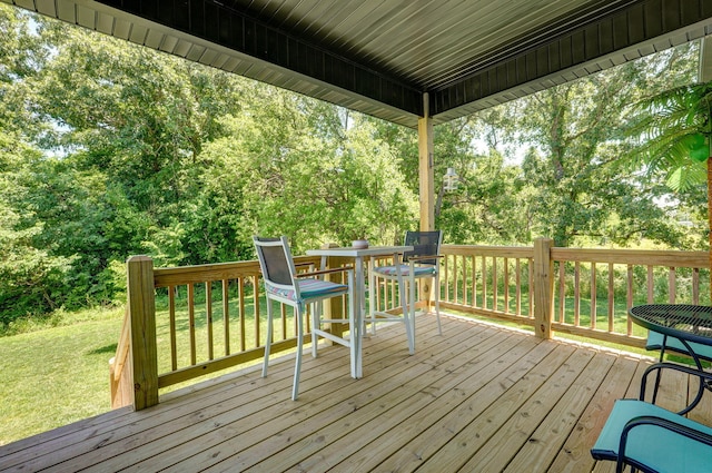 653 W Arbor Glenn Dr, Nixa, MO 65714 - wooden deck with a yard and view of wooded area
