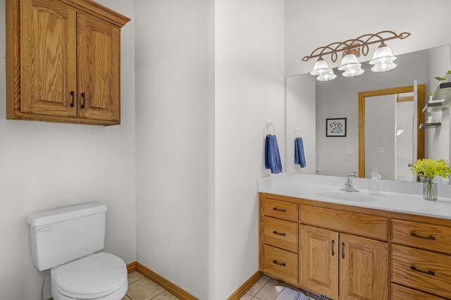 1190 E Headley St, Springfield, MO 65803 - bathroom with vanity and tile patterned floors