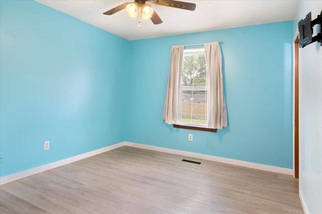 1219 N Clifton Ave, Springfield, MO 65802 - spare room with ceiling fan and wood finished floors