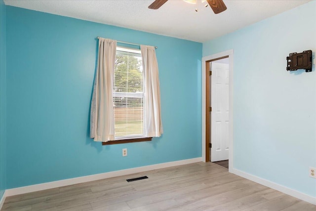 1219 N Clifton Ave, Springfield, MO 65802 - unfurnished room with ceiling fan and wood finished floors