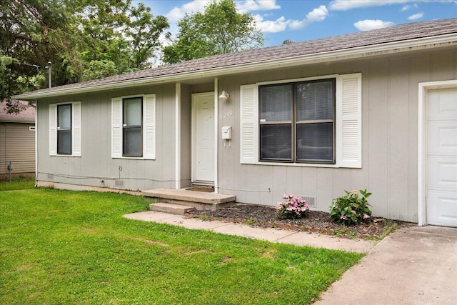 1219 N Clifton Ave, Springfield, MO 65802 - entrance to property featuring crawl space, a yard, and a shingled roof