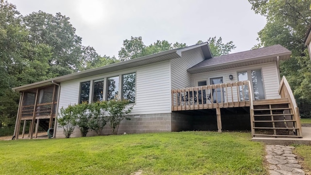 24 Oniatara Ln, Cherokee Village, AR 72529 - back of house with a deck, a yard, stairs, and a sunroom