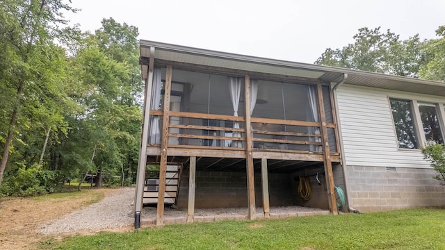 24 Oniatara Ln, Cherokee Village, AR 72529 - rear view of house featuring a sunroom, stairs, crawl space, and a deck