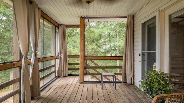 24 Oniatara Ln, Cherokee Village, AR 72529 - sunroom with hardwood / wood-style flooring and wooden ceiling