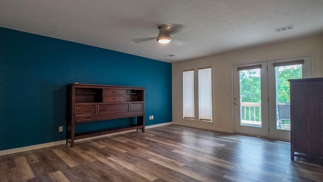 24 Oniatara Ln, Cherokee Village, AR 72529 - unfurnished living room with a ceiling fan and wood finished floors