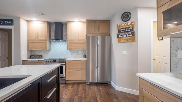 24 Oniatara Ln, Cherokee Village, AR 72529 - kitchen featuring stainless steel appliances, wall chimney range hood, dark wood-type flooring, backsplash, and recessed lighting