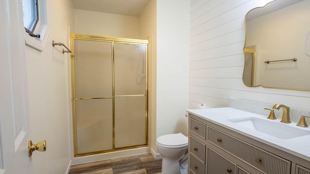 24 Oniatara Ln, Cherokee Village, AR 72529 - full bathroom featuring vanity, a shower stall, and wood finished floors