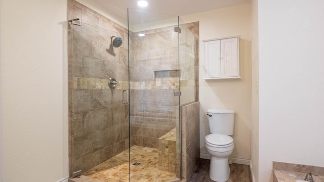 24 Oniatara Ln, Cherokee Village, AR 72529 - full bathroom with a stall shower and wood finished floors