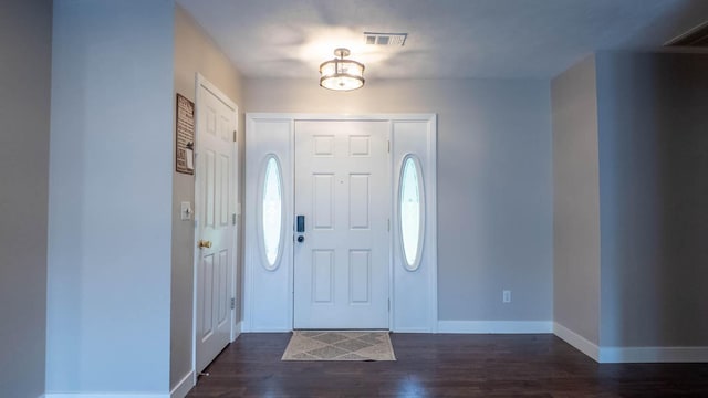 24 Oniatara Ln, Cherokee Village, AR 72529 - foyer with dark wood-type flooring and baseboards