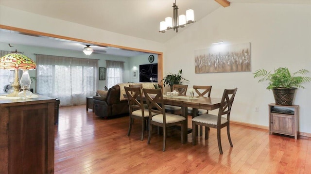 3837 Lazy Acres Rd, Protem, MO 65733 - dining room with light wood-style flooring, a chandelier, and a ceiling fan