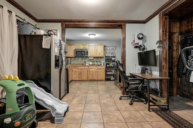 207 W Grand, Neosho, MO 64850 - kitchen with appliances with stainless steel finishes, a textured ceiling, ornamental molding, light brown cabinets, and tasteful backsplash