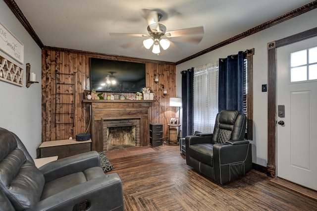 207 W Grand, Neosho, MO 64850 - living area featuring a ceiling fan, crown molding, and a fireplace