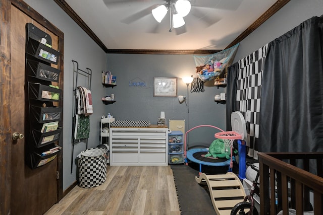 207 W Grand, Neosho, MO 64850 - bedroom featuring crown molding, wood finished floors, and ceiling fan