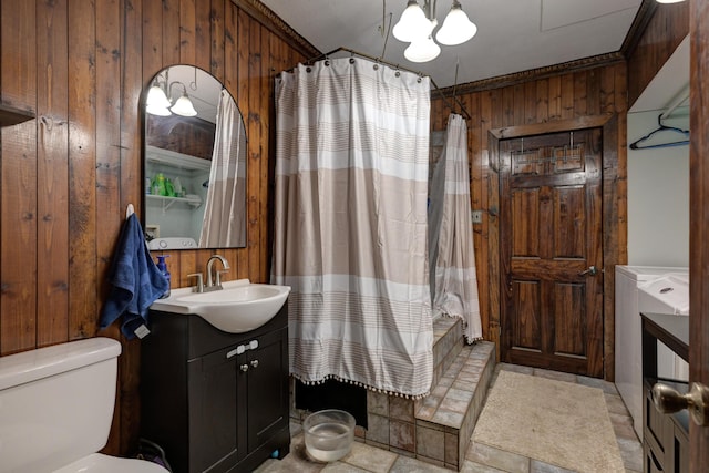 207 W Grand, Neosho, MO 64850 - bathroom featuring wood walls, vanity, a chandelier, and a shower with shower curtain