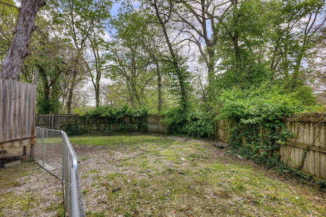 207 W Grand, Neosho, MO 64850 - view of fenced backyard
