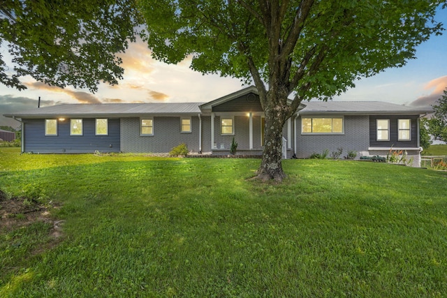 5295 E Farm Road 138, Springfield, MO 65809 - rear view of property with a lawn and brick siding