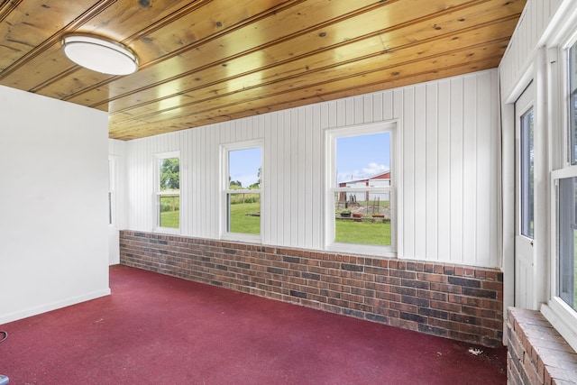 5295 E Farm Road 138, Springfield, MO 65809 - unfurnished sunroom with wooden ceiling, carpet flooring, and plenty of natural light