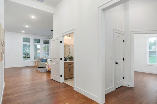 5030 E Swale Ct, Springfield, MO 65802 - corridor featuring wood finished floors, recessed lighting, and a towering ceiling