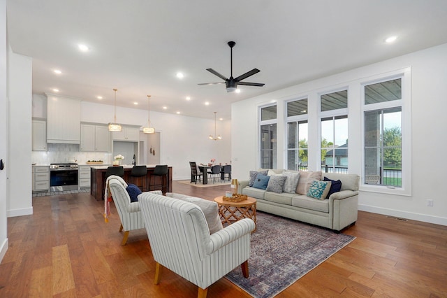 5030 E Swale Ct, Springfield, MO 65802 - living area featuring a ceiling fan, wood finished floors, and recessed lighting