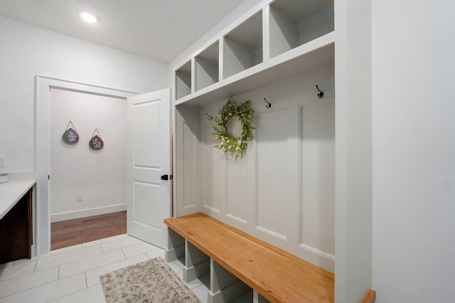 5030 E Swale Ct, Springfield, MO 65802 - mudroom featuring light tile patterned floors and recessed lighting