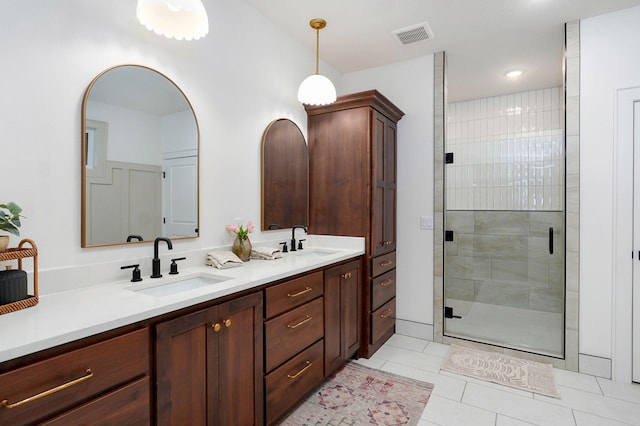 5030 E Swale Ct, Springfield, MO 65802 - full bath featuring double vanity, tile patterned flooring, and a stall shower