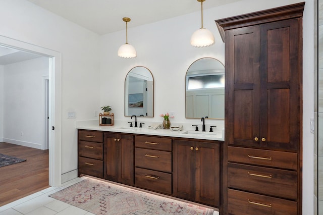 5030 E Swale Ct, Springfield, MO 65802 - bathroom featuring double vanity and tile patterned flooring