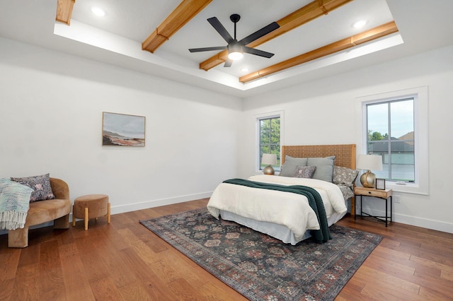 5030 E Swale Ct, Springfield, MO 65802 - bedroom with wood finished floors, beam ceiling, recessed lighting, a raised ceiling, and ceiling fan