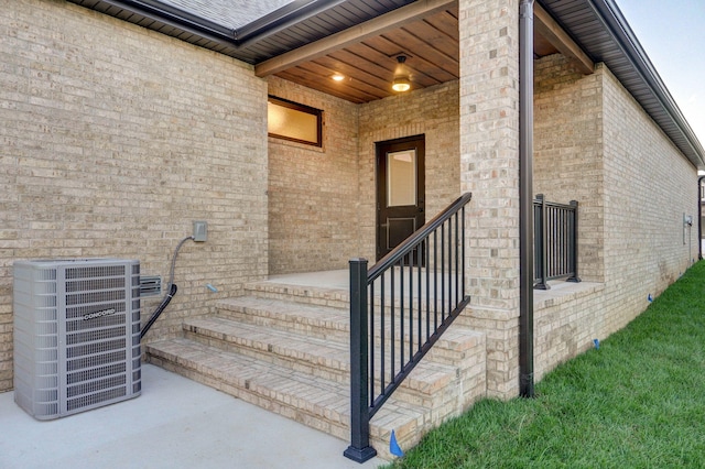 5030 E Swale Ct, Springfield, MO 65802 - view of exterior entry featuring brick siding
