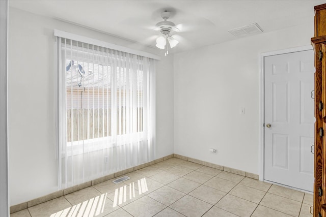 855 Birch St, Nixa, MO 65714 - spare room featuring ceiling fan and light tile patterned floors