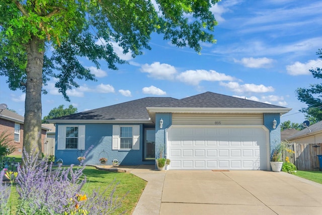 855 Birch St, Nixa, MO 65714 - ranch-style house with an attached garage, driveway, and roof with shingles